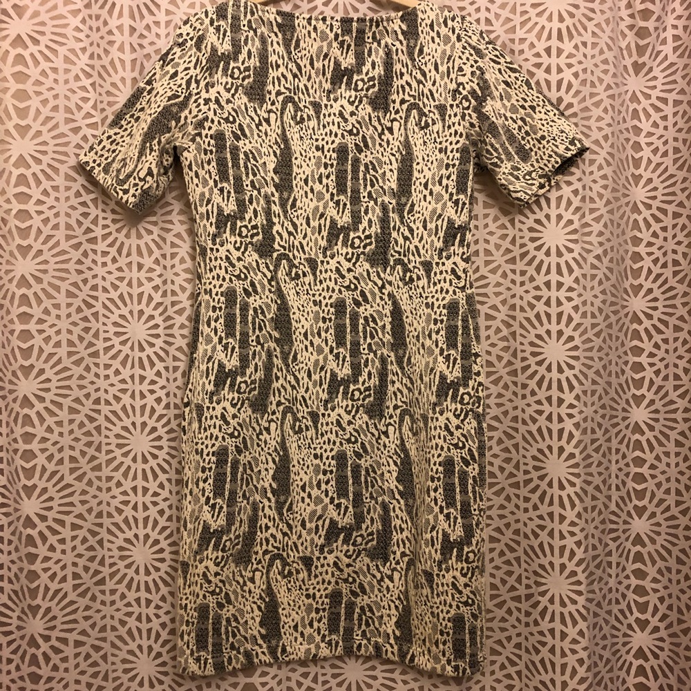 Abstract patterned figure flattering dress